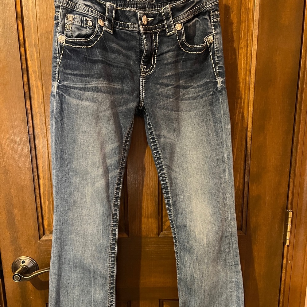 Miss Me boot cut distressed jeans in excellent condition.